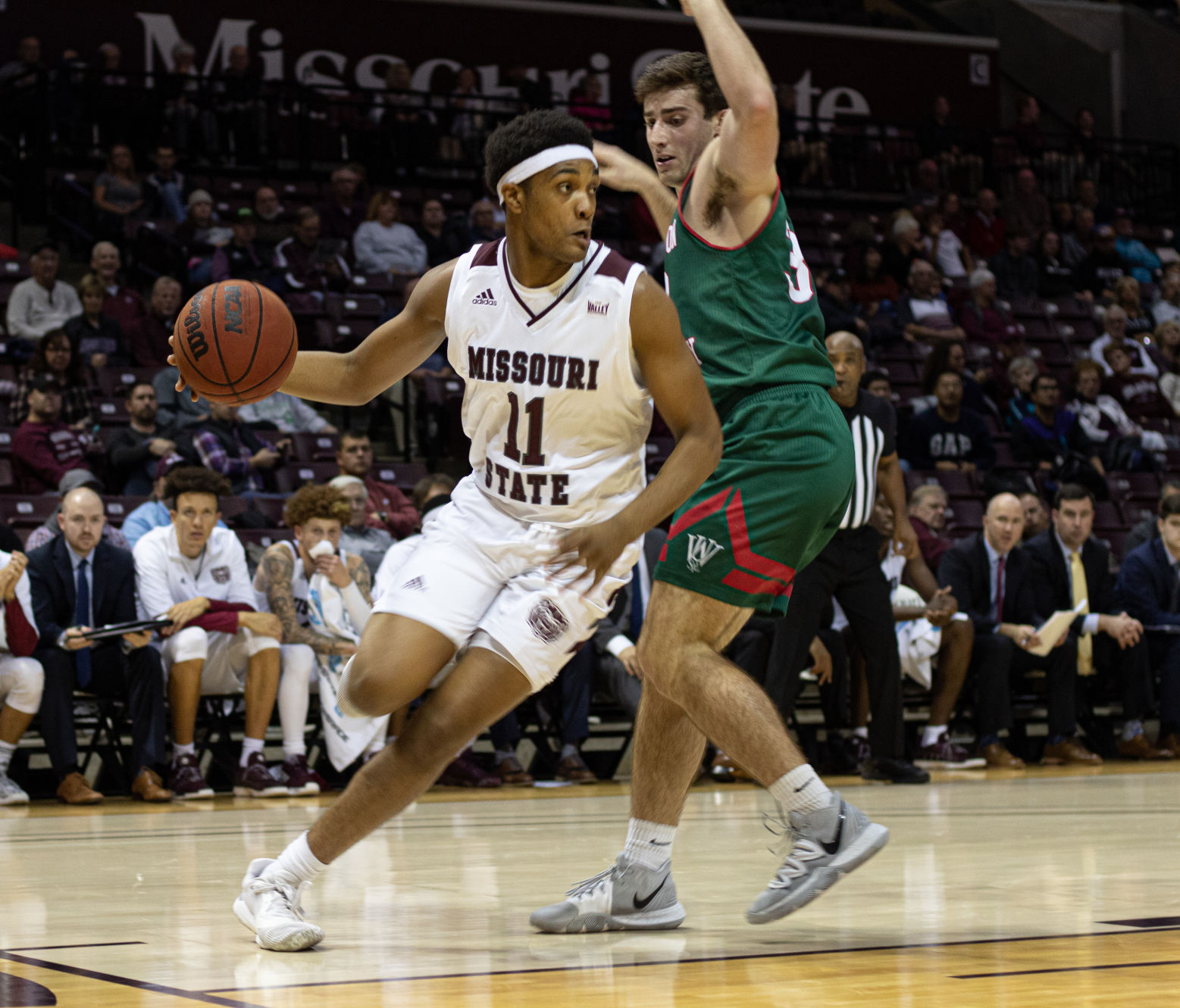 Freshman Isiaih Mosley drives the baseline